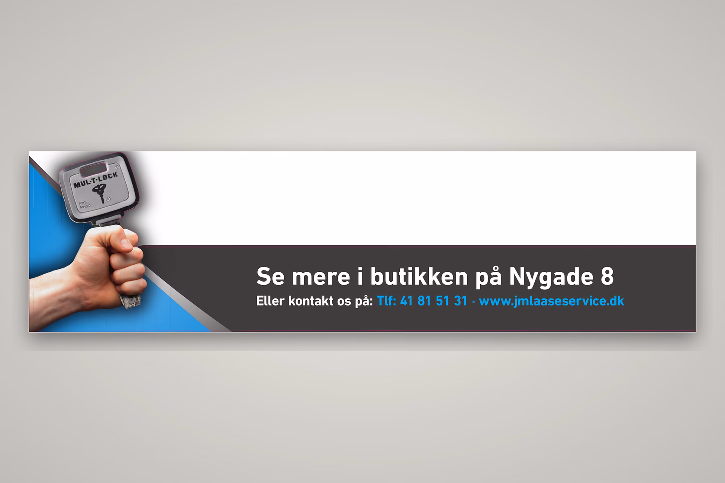 Vinduesfolie til JM Låseservices butik på Nygade 8